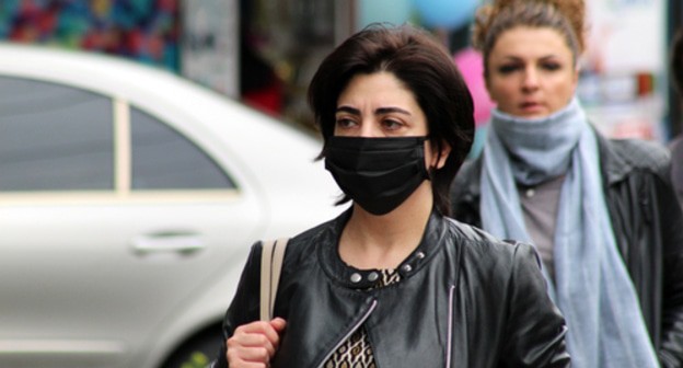 A woman in a medical mask. Photo by Tigran Petrosyan for the Caucasian Knot