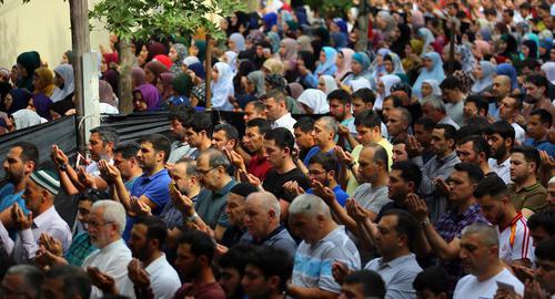 People praying on Eid al-Fitr. Photo by Aziz Karimov for the Caucasian Knot