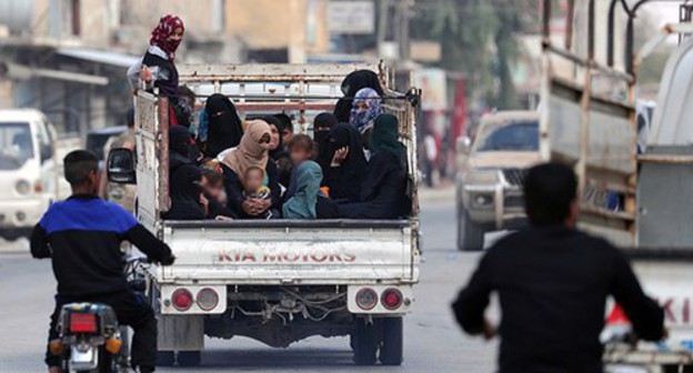 Women and children in a truck. Syria, October 2019. Photo: REUTERS/Khalil Ashawi