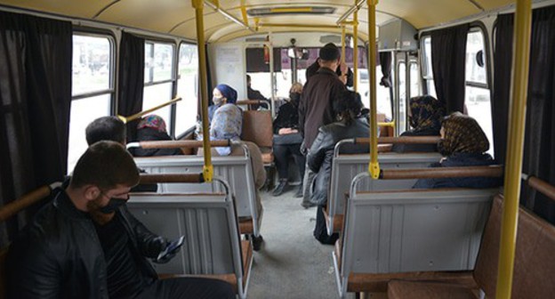 Chechen residents in a bus. Photo: REUTERS/Ramzan Musaev