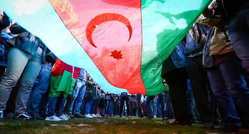 Flag of Azerbaijan at a protest action. Photo by Aziz Karimov for the Caucasian Knot