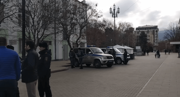 Activists and policemen after checking the reconstruction work quality in a square in Makhachkala. Screenshot from the video posted by the Caucasian Knot