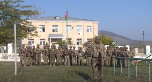 The military reported to the President of Azerbaijan on the establishment of control over the city of Zangilan 
in Nagorno-Karabakh, October 20, 2020. Screenshot of the video posted at the DTX official YouTube channel https://www.youtube.com/watch?v=nvRyXmkQL7s&amp;feature=emb_logo