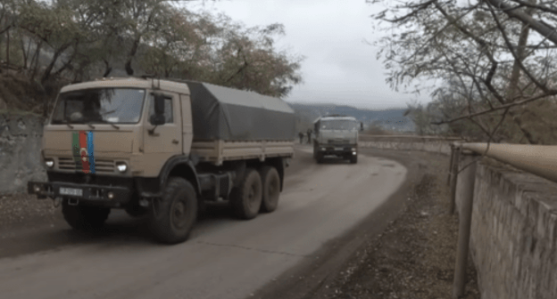 The Azerbaijani vehicles in Nagorno-Karabakh escorted by Russian peacemakers. Screenshot of the video https://youtu.be/5IhmwOYyZPA