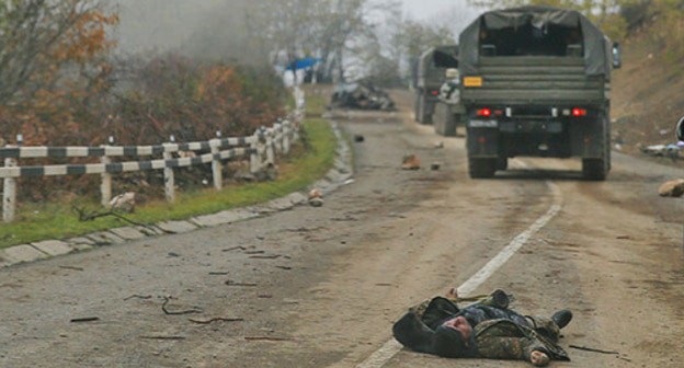 A dead man in military uniform during the hostilities in Nagorno-Karabakh. November 2020. Photo: REUTERS/Stringer