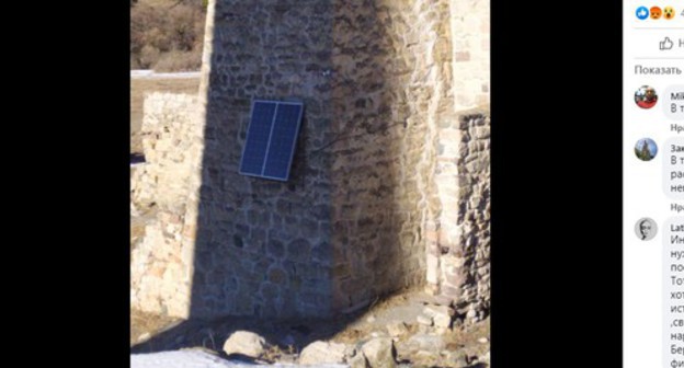 Solar panels installed on a historic tower in the mountains of Ingushetia. Screenshot of the post on Khanifa Ozdoeva's Facebook https://www.facebook.com/photo?fbid=408602777030855&amp;set=a.113987936492342