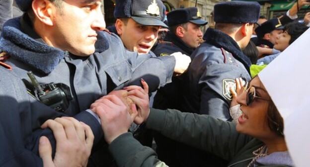 A participant of a protest action in Baku. Photo by Aziz Karimov for the "Caucasian Knot"