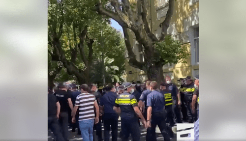 Policemen at a rally in Batumi, June 20, 2021. Screenshot: http://www.facebook.com/watch/?ref=external&v=784421552265443