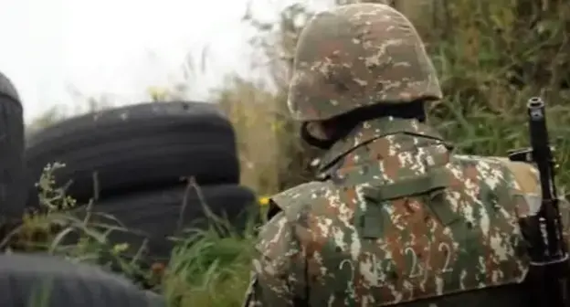 An Armenian soldier at a combat post. Screenshot of video posted by the Ministry of Defence of Armenia, http://mil.am/hy/news/9921