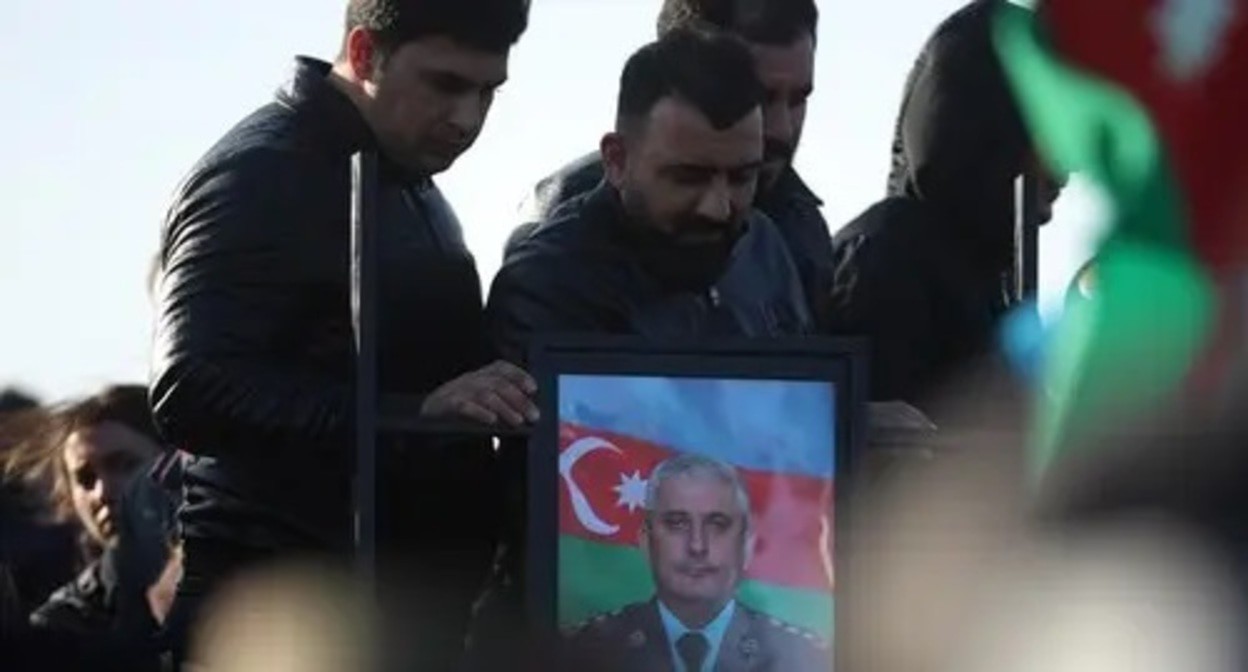 Portrait of a deceased officer at a funeral. Photo by Aziz Karimov for the Caucasian Knot