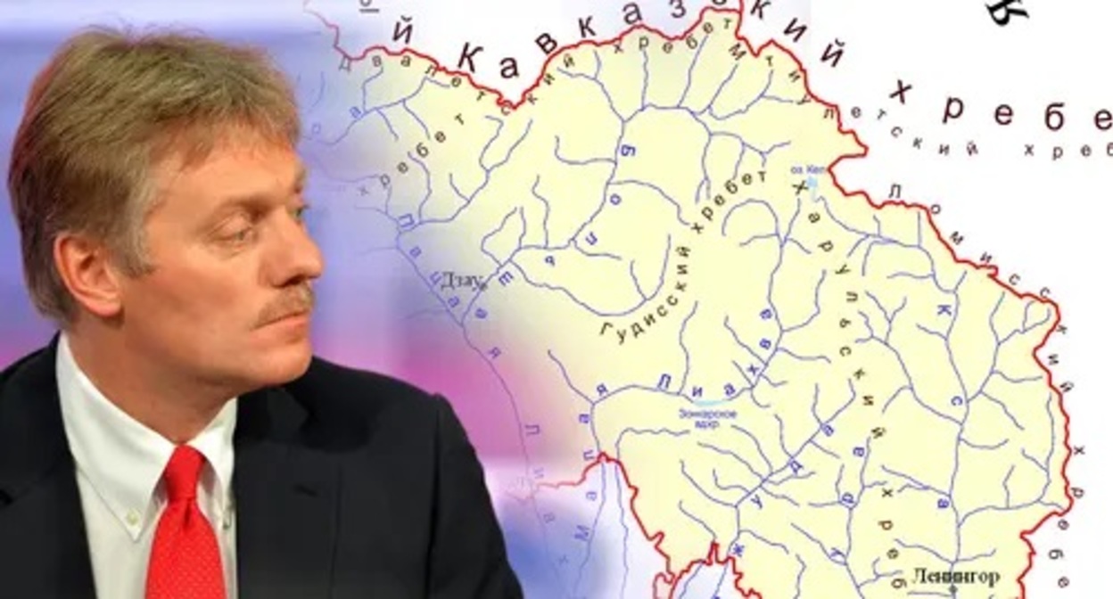 Dmitry Peskov, map of South Ossetia. Photo: Kremlin press service, ru.m.wikipedia.org