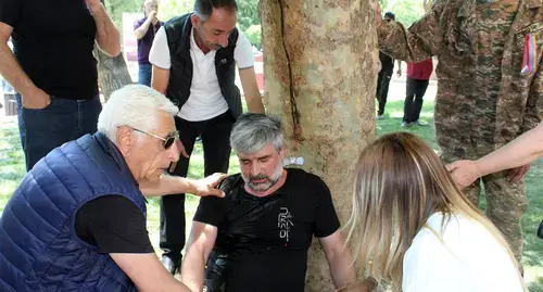 An opposition supporter fainted after the clashes with the police. Photo by Tigran Petrosyan for the "Caucasian Knot"