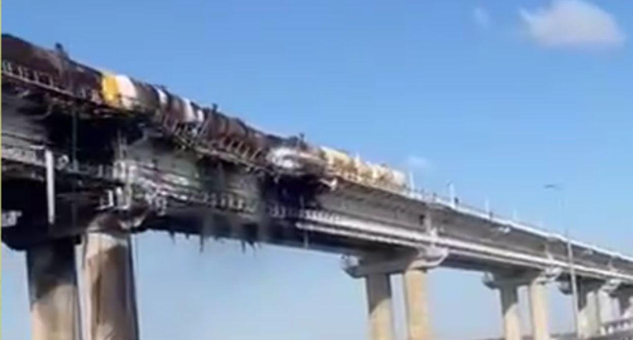 The consequences of the truck explosion on the Crimean Bridge. Screenshot of the video posted on the Telegram channel Mash, https://t.me/breakingmash/38826