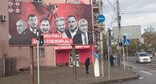 An election billboard criticizing the Georgian opposition on a street in Kutaisi. Photo by Beslan Kmuzov for the "Caucasian Knot"