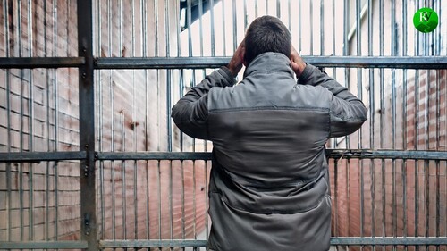 A prisoner suffering from a headache. Picture made in Photoshop by the "Caucasian Knot"